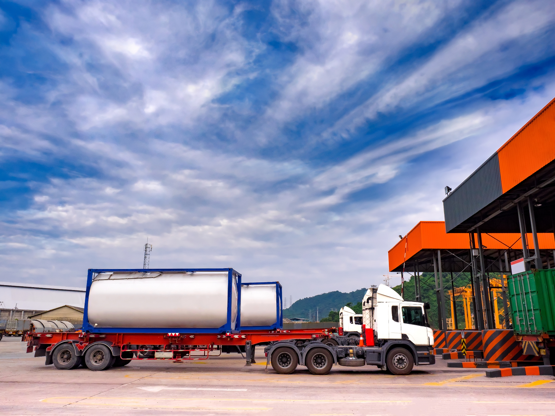 ISO tank container on trailer at an APAC industrial terminal — bulk liquid petroleum and specialty oil logistics supported by Sanyang Petroleum.